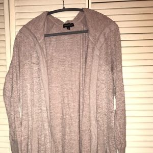 Long sweater with hoodie and pockets